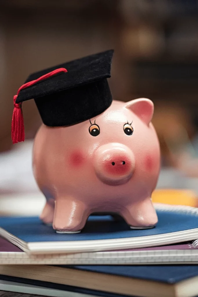 How NOT to Spend Your Student Loan, piggy bank graduate